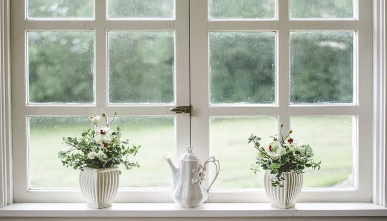decorative-plant-pots-on-window-ledge-small